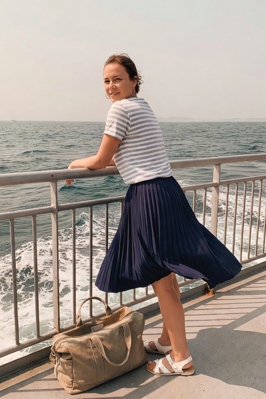Striped Tee And Navy Pleated Skirt