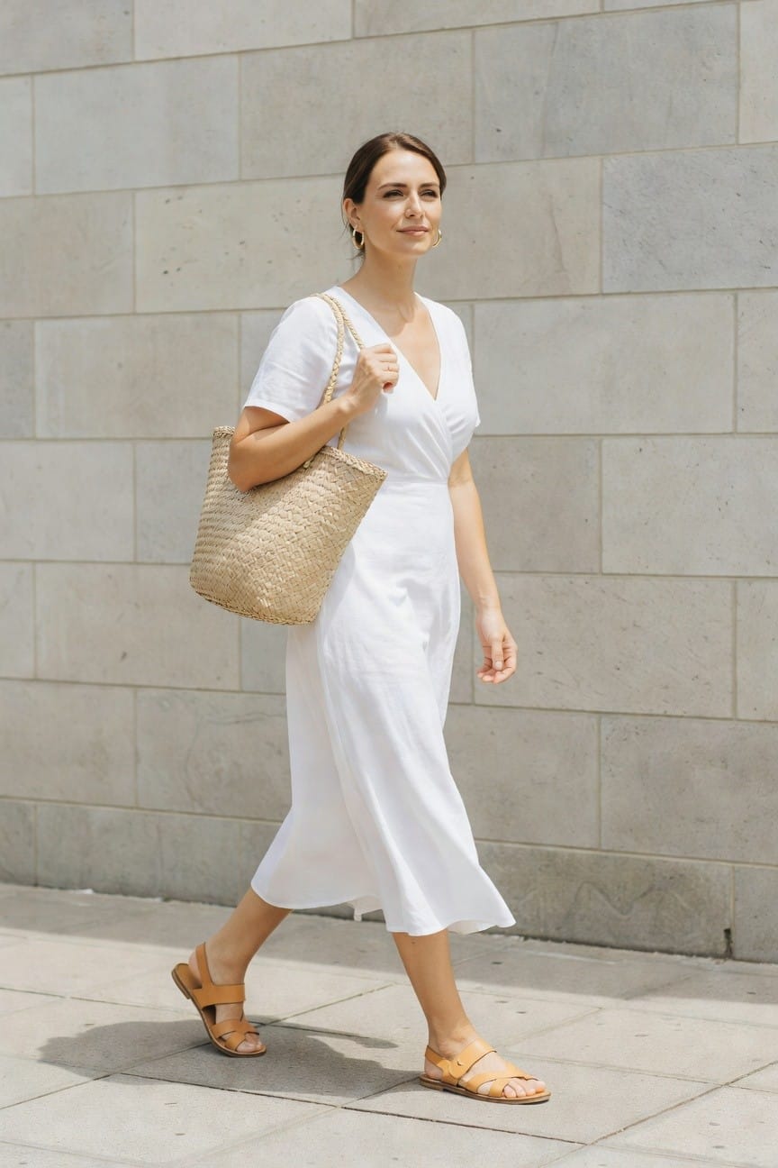 White Wrap Dress With Straw Tote And Sandals
